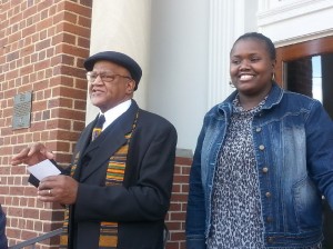 Sheerica Ware (right) prepares to give her speech Monday on the steps of Toccoa City Hall