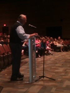 Local resident Art Conway speaks to the school board at Monday's public hearing
